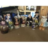Four boxes containing a large collection of various Toby jugs of various sizes and designs,