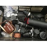 A Collection Of various cameras lenses and equipment including Nikon, pracktica