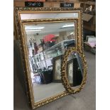 Three gilt framed mirrors, the largest measuring 9