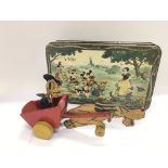 A circa 1930s Disney tin and a circa 1934 Donald Duck and Pluto pull along toy (2).