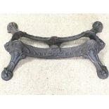 A rare Victorian cast iron bike stand with bat heads ends.