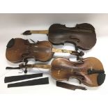 Three distressed violins for restoration, one Labe