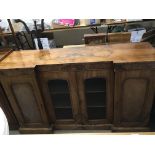 A walnut chiffonier with two glass panelled doors
