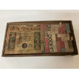 A 1920s Lotts Tudor Blocks No.3 building set.