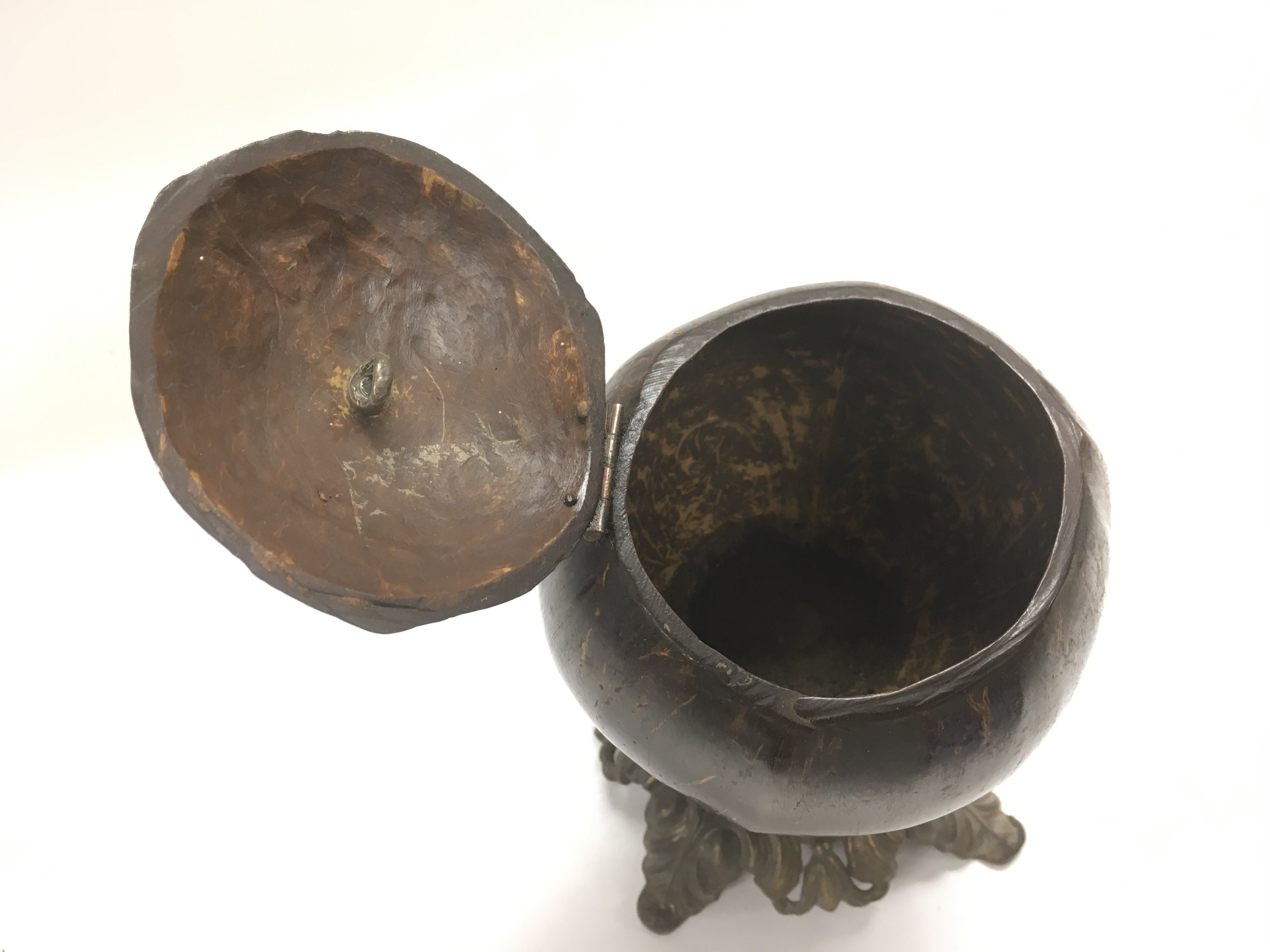 A Victorian polished coconut shell tea caddy raised on a metal base and with an ivory handle, approx - Image 3 of 3