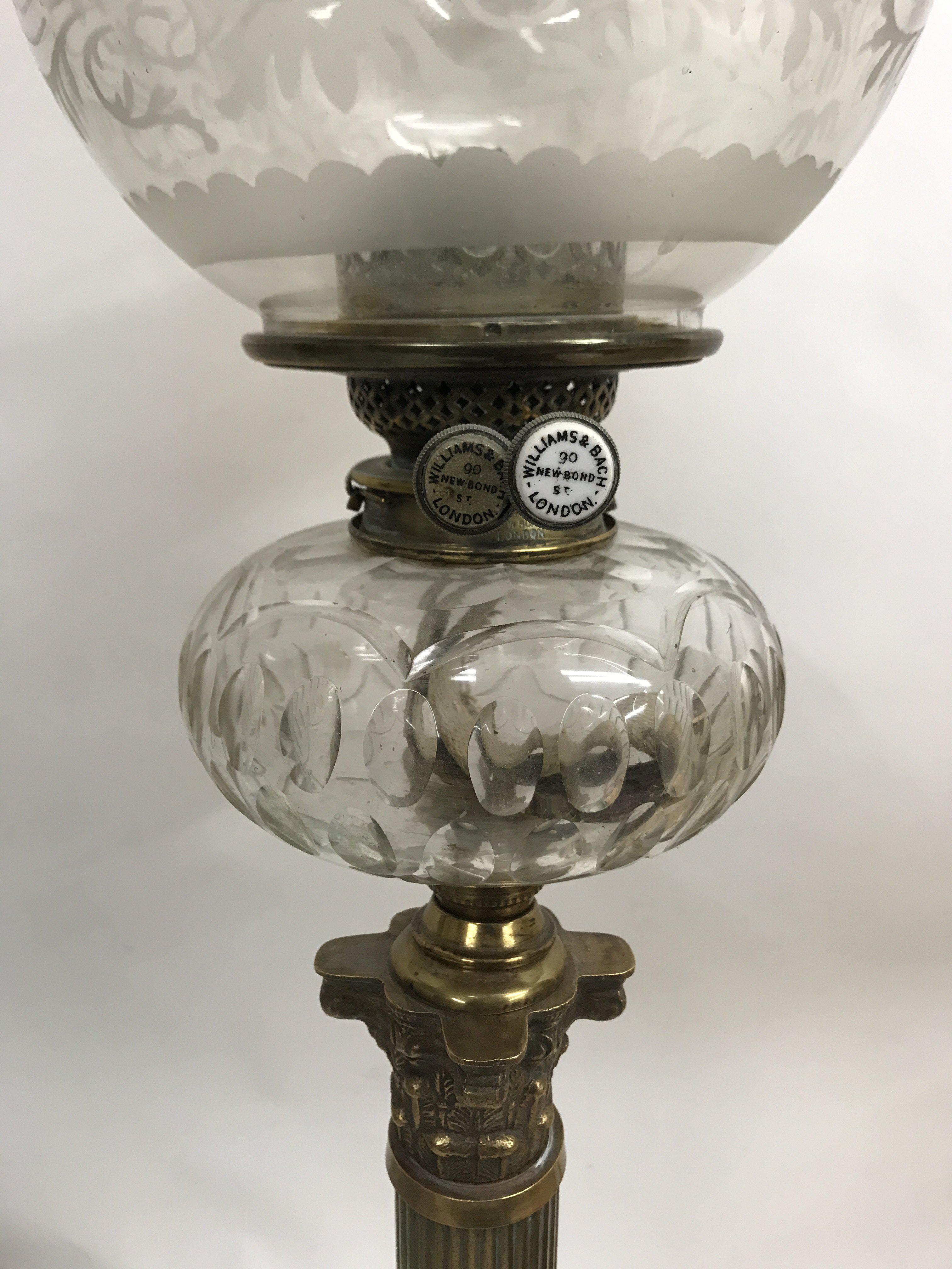 A Victorian Williams Bach oil lamp with glass shad