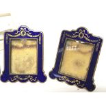 A pair of quality early 20th century blue enamel small photo frames a pair of fillagree sugar nips