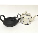 A Victorian moulded bisque type tea pot and Regenc