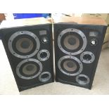 A pair of Wharfedale E30 speakers.