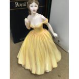 A collection of 10 boxed Royal Doulton figures.