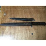 A Swedish hunting knife and bayonet.