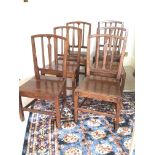 A set of six early 19th century vernacular provincial mahogany dining chairs with open backs and