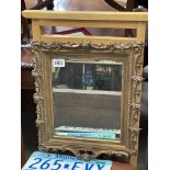 An early Wood and gesso frame mirror.