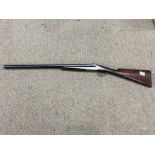 A deactivated 12 bore double barrel shotgun by Mas