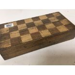 A folding box chessboard with wooden chess pieces