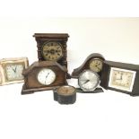 A collection of small mantel clocks and a vintage