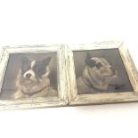 Two antique framed ceramic tiles depicting dogs (2