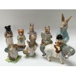 A collection of Royal Albert and Beswick figures including Beatrix Potter animals