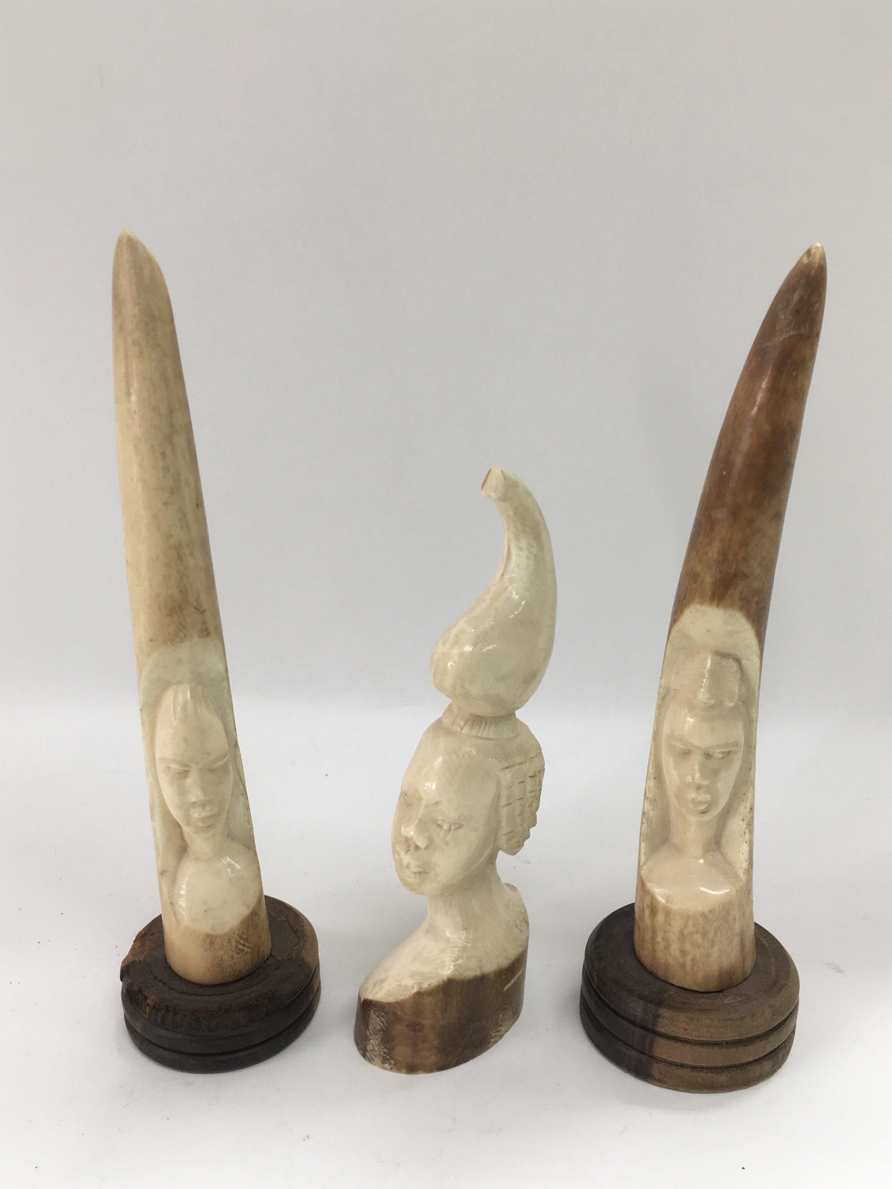 Three early 20th Century carved ivory tusks, talle