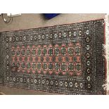Two rugs of geometric designs. 165 by 95 cm and 15