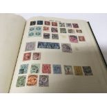An old stock book stamp album the collection of wo