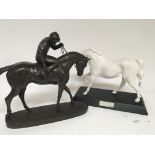 A modern sculpture of a jockey up after the race and a Spirit of Freedom white horse (2) - NO