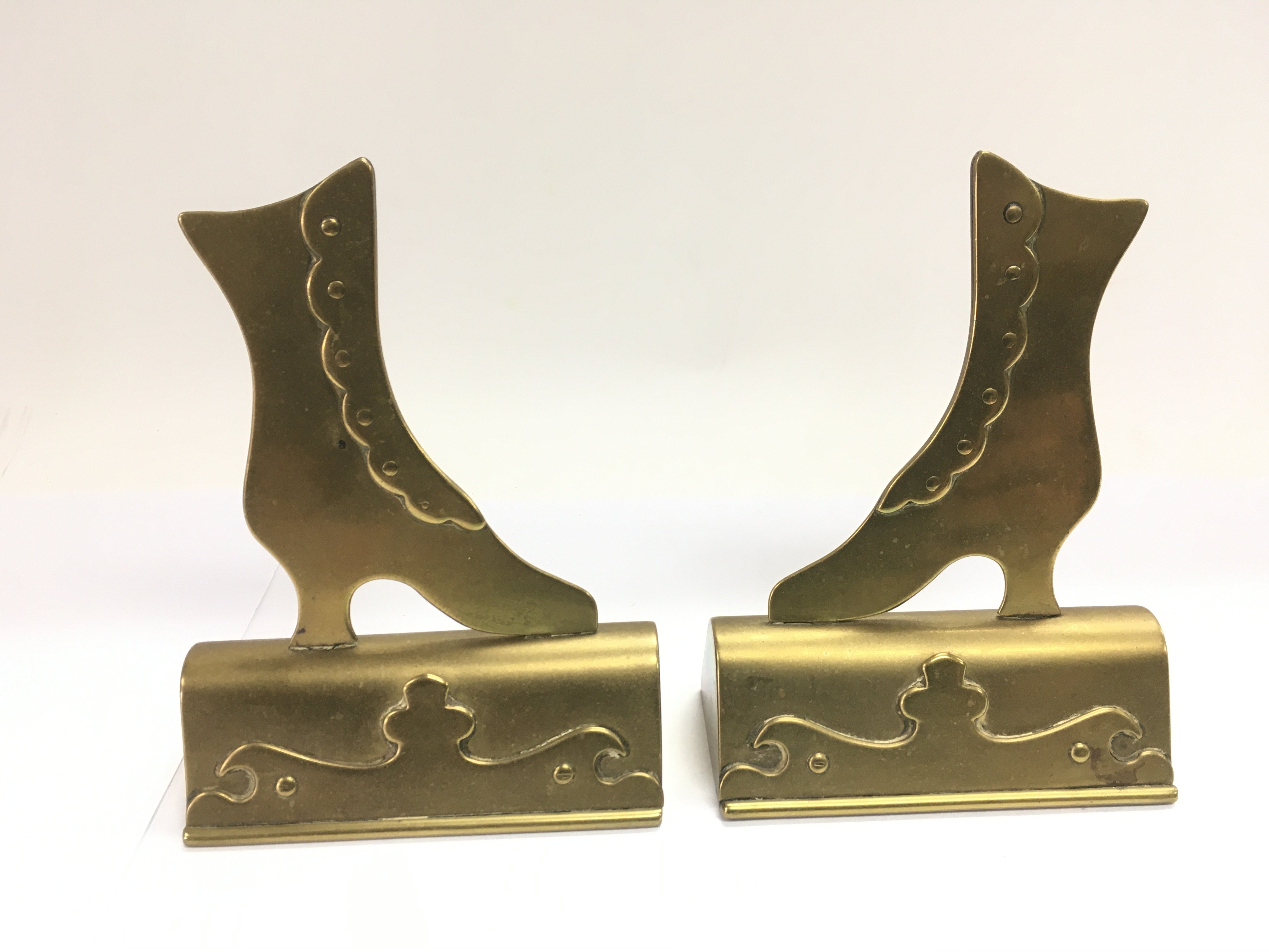 A pair of brass place holders in the form of boots, approx height 14cm - NO RESERVE