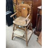 A Victorian childâ€™s metamorphic high chair.