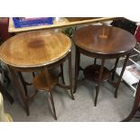 A pair of Edwardian circular inlaid occasional tables.