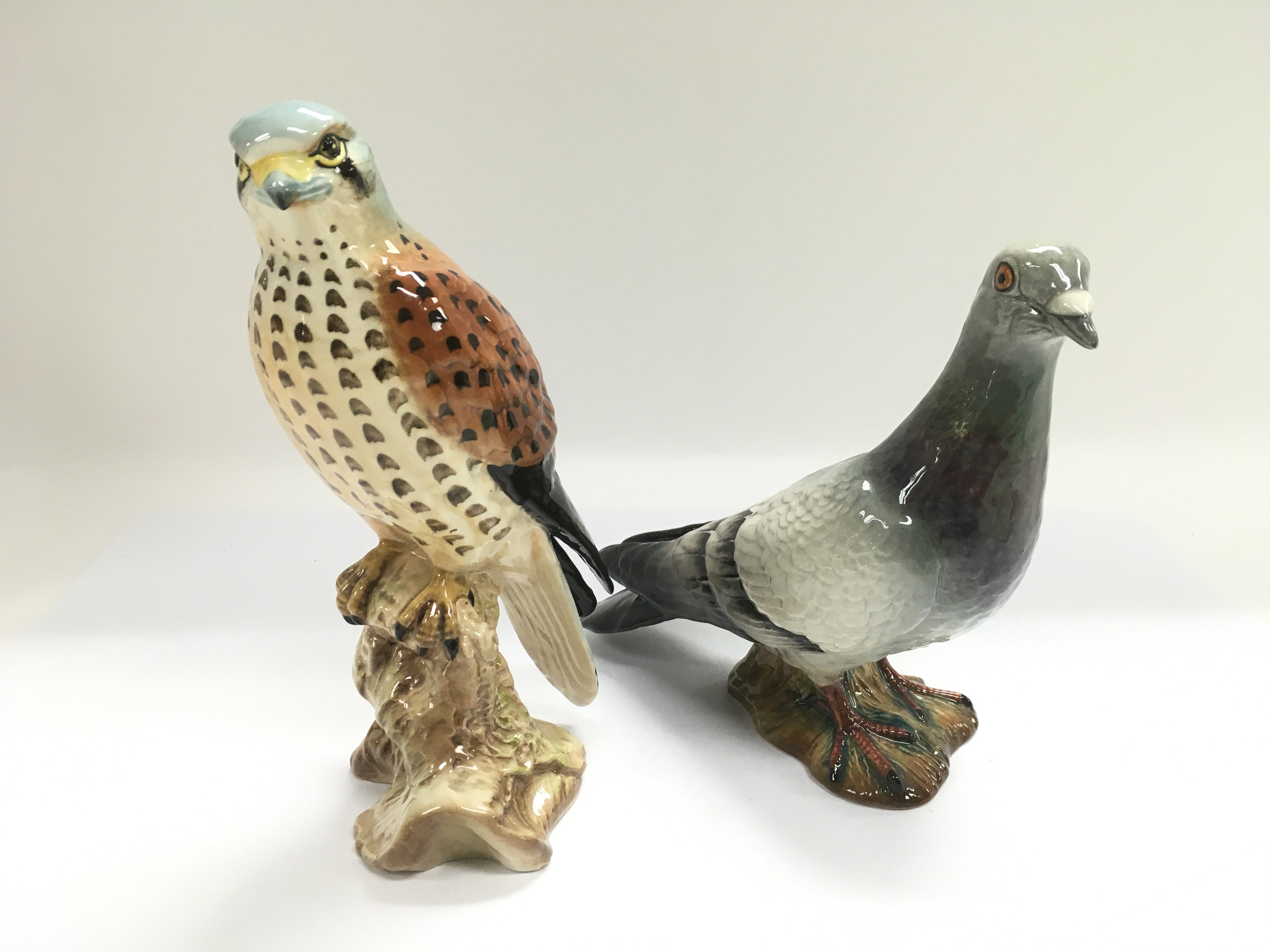 Two Beswick figures of birds comprising a Kestrel,