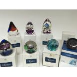 A collection of eight Caithness boxed paperweights including some limited editions The Double