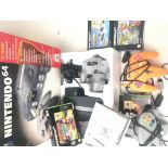 A. Boxed Nintendo 64 plus 4 Games and 2 extra Cont