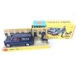 A Boxed Corgi B.M.C. Mini Police Dog Van With Trac