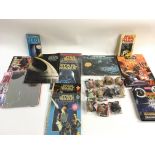 Collection of various Star Wars books and topps. N