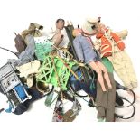A Box Containing a Collection of Action Men and Accessories