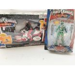A Power Rangers S.P.D Radio Control Cycle and a Carded Green Ranger. Both boxed - NO RESERVE