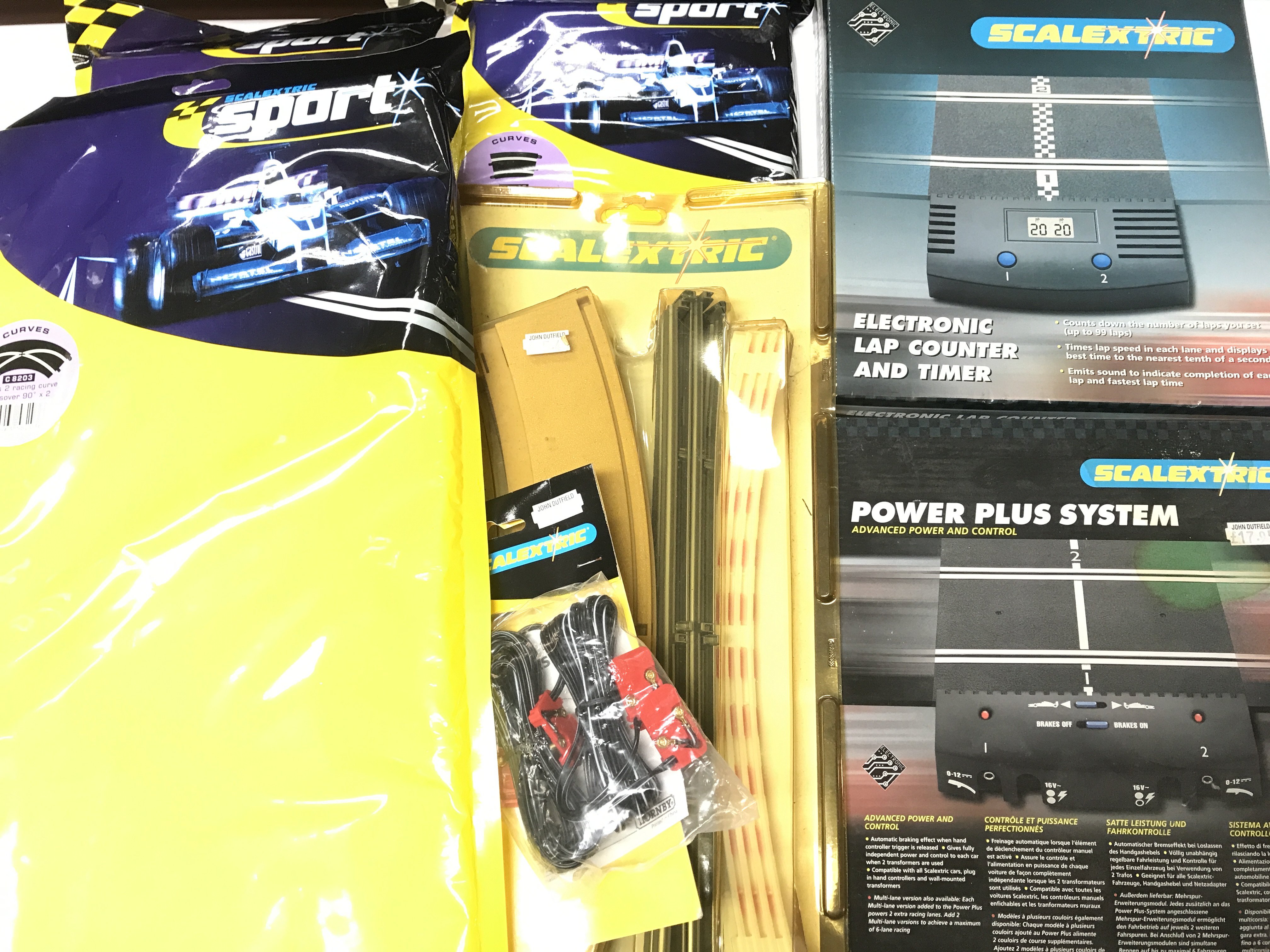 A Collection of Scalextric Track.Kerbs. Barriers. Clips. Power plus system all new and sealed. - Image 2 of 2