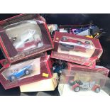 A Box containing a collection of boxed and loose die Cast Vehicles. Matchbox.Lledo etc. and small