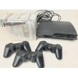 A Playstaion 3 with 24 Games. And 3 Controllers.(2