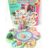 A Boxed Polly Pocket Dream World (parts missing).