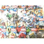 A Box Containing a Collection of Marvel Universe Figures and Super Hero Figures. All Carded.