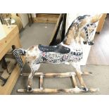 A Wooden Rocking Horse. Approx height 96cm.