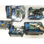 Collection of various Tron legacy toys. Including