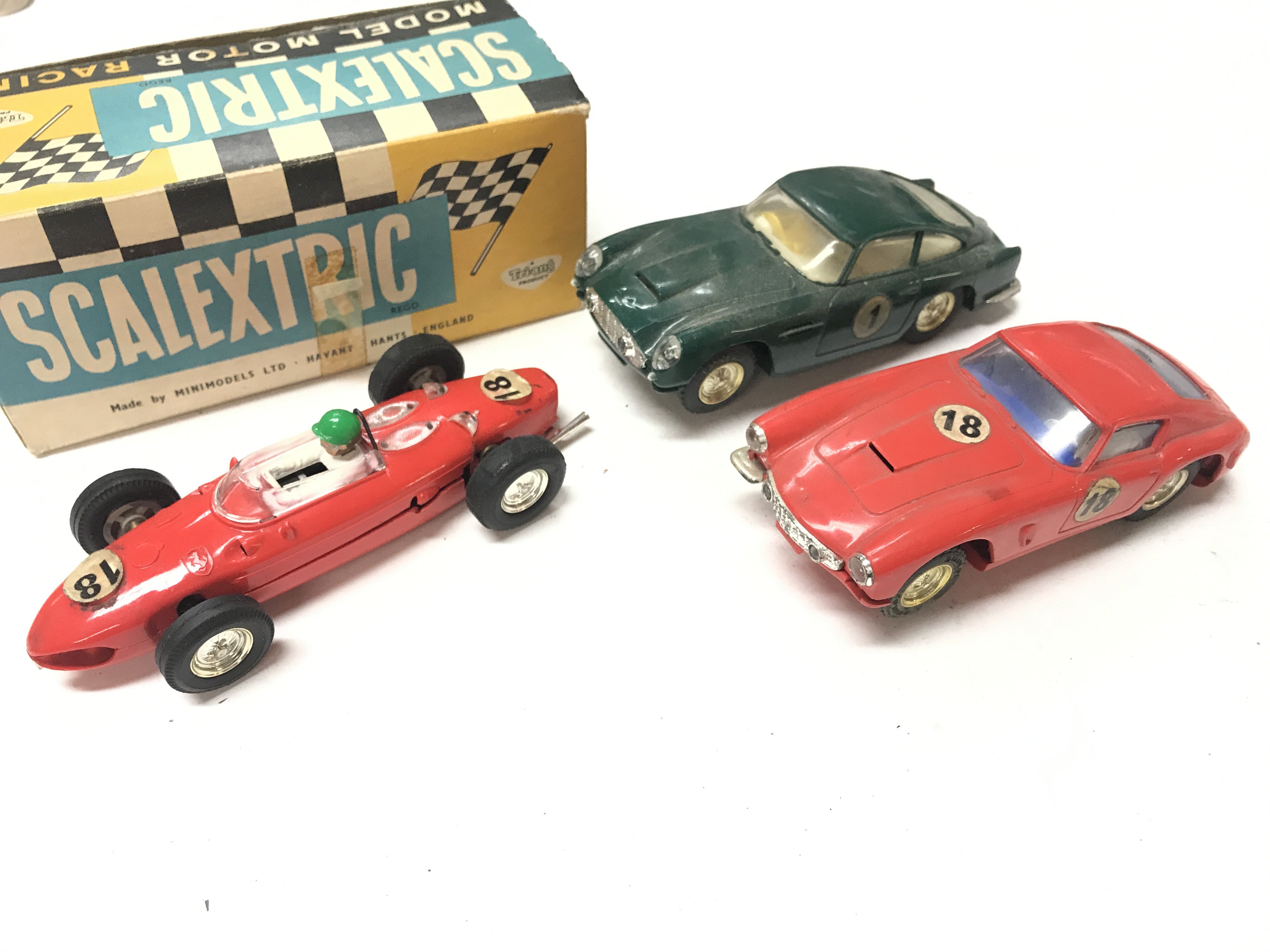 A Boxed Scalextric Ferrari #C62. A Loose Ferrari GT 250 Berlinetta #C69 and a Aston Martin D.B.4