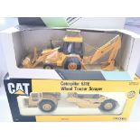 2 X Ertl Die Casts including a Caterpillar 631e Wheel TractorScraper and a John Deere Loader/