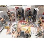 A Collection of WWE Figures including Randy Orton. Roman Reigns. Becky Lynch.Etc.