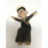 An HMS Victory felt doll.