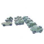 A Collection of Dinky Military Vehicles including Field Artillery Tractors.Scout Cars and Armoured