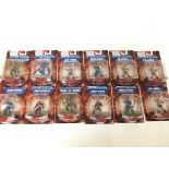 12 x various He-Man masters of the universe carded