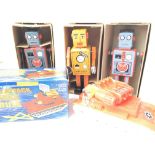 A Collection of 3 Tinplate robots and a Space Atta